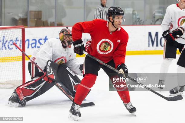 Taylor Hall of the Chicago Blackhawks screens Arvid Soderblom of the Chicago Blackhawks during a scrimmage at Fifth Third Arena on September 25, 2023...