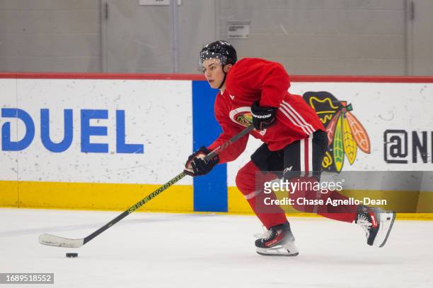 Connor Bedard of the Chicago Blackhawks carries the puck up ice during a scrimmage at Fifth Third Arena on September 25, 2023 in Chicago, Illinois.