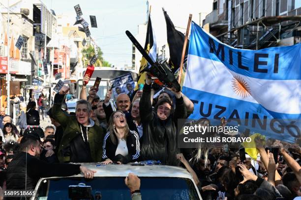 Argentine congressman and presidential candidate for the La Libertad Avanza Alliance, Javier Milei , waves a chainsaw during a campaign rally in San...