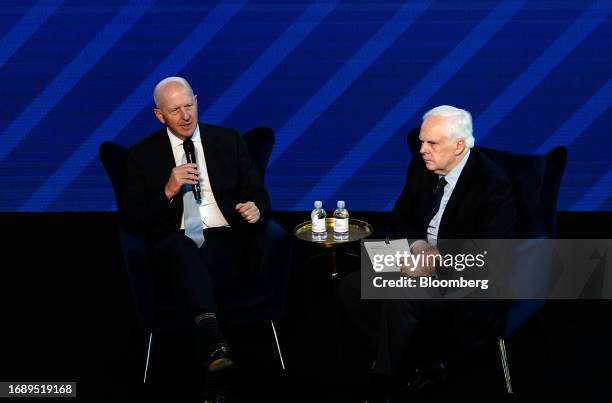 David Solomon, chief executive officer of Goldman Sachs Group Inc., left, speaks with Frederick Smith, founder and executive chairman of FedEx Corp.,...