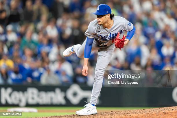 Joe Kelly of the Los Angeles Dodgers pitches during the game between the Los Angeles Dodgers and the Seattle Mariners at T-Mobile Park on Saturday,...