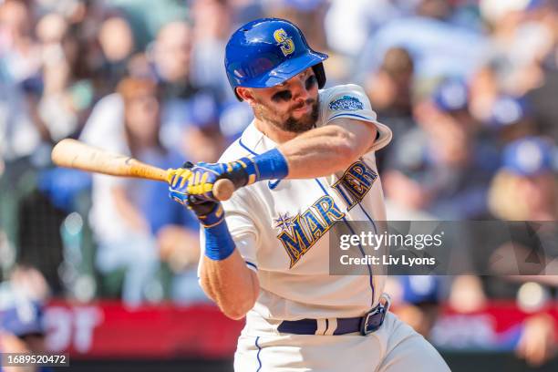 Cal Raleigh of the Seattle Mariners bats during the game between the Los Angeles Dodgers and the Seattle Mariners at T-Mobile Park on Sunday,...