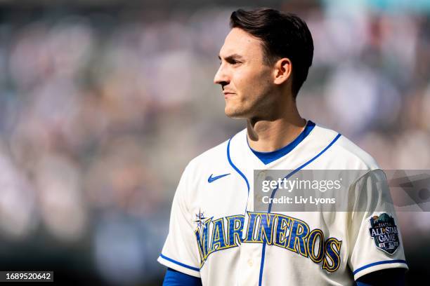 Dominic Canzone of the Seattle Mariners looks on between innings during the game between the Los Angeles Dodgers and the Seattle Mariners at T-Mobile...