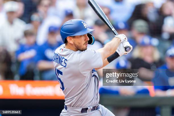 Austin Barnes of the Los Angeles Dodgers bats during the game between the Los Angeles Dodgers and the Seattle Mariners at T-Mobile Park on Sunday,...