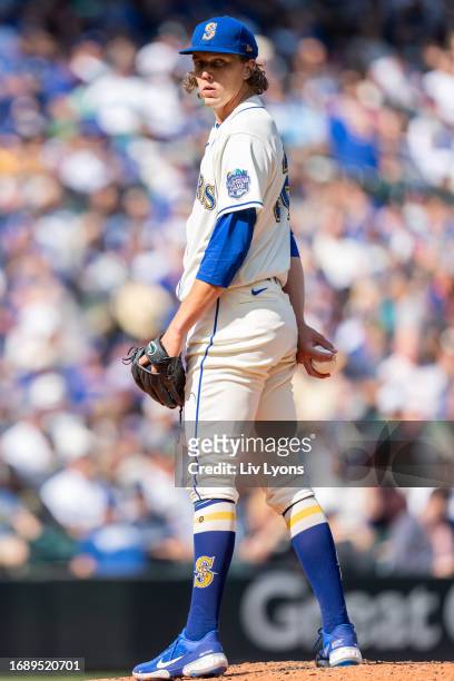 Logan Gilbert of the Seattle Mariners looks towards the runner at first base during the game between the Los Angeles Dodgers and the Seattle Mariners...