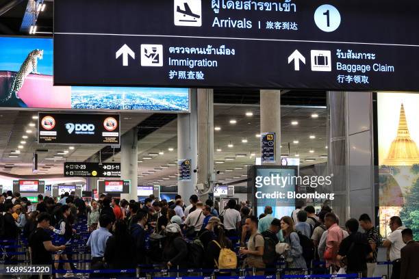 Travelers at Suvarnabhumi Airport in Bangkok, Thailand, on Monday, Sept. 25, 2023. Thailand agreed to waive visa requirements for travelers...