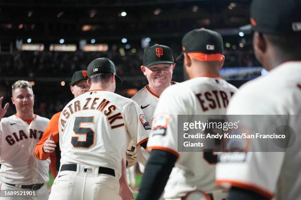 Logan Webb of the San Francisco Giants celebrates a win against the San Diego Padres at Oracle Park on September 25, 2023 in San Francisco,...