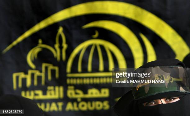 Palestinian supporter of the Islamic Jihad movement attends a protest calling for the release of Palestinians held Israeli prisons on March 31, 2008...