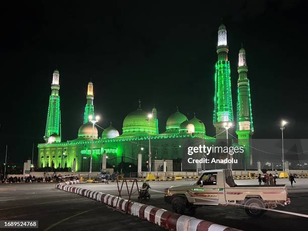 Mosques, vehicles and buildings are illuminated with green lights during Mawlid al-Nabi celebrations in Sanaa, Yemen on September 25, 2023.