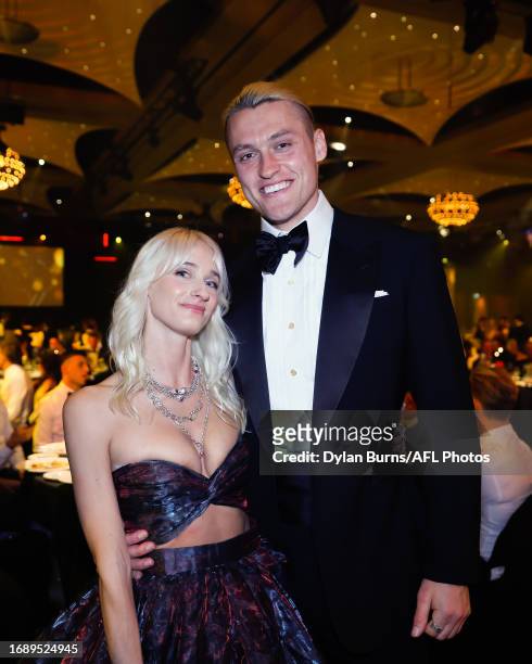 Darcy Moore of the Magpies and Dee Salmin pose for a photo during the 2023 Brownlow Medal at Crown Palladium on September 25, 2023 in Melbourne,...