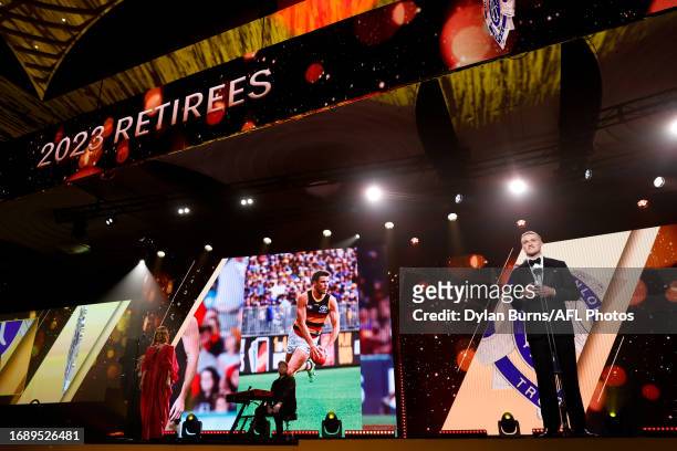 Darcy Moore of the Magpies honours the 2023 retiring players during the 2023 Brownlow Medal at Crown Palladium on September 25, 2023 in Melbourne,...
