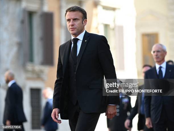 France's President Emmanuel Macron arrives at the Palazzo Montecitorio, hosting the Italian Chamber of Deputies, to attend late Italian President...