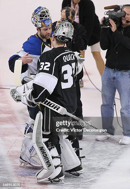 Goaltenders Brian Elliott of the St. Louis Blues and Jonathan Quick of the Los Angeles Kings shake hands after Game Six of the Western Conference...