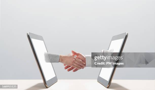 digital handshake - digital trust stock pictures, royalty-free photos & images