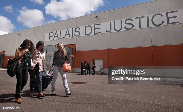 Plaintiff, Virginia Luna and a lawyer from Argentina leave the courthouse on the last day of the PIP trial at Parc Chanot on May 17, 2013 in...