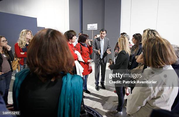 Marseille's prosecutor Jacques Dallest speaks with a plaintiff during the last day of the PIP trial at Parc Chanot on May 17, 2013 in Marseille,...