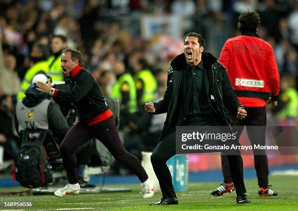 Head coach Diego Simeone of Atletico de Madrid celebrates their first goal during the Copa del Rey Final match between Real Madrid CF and Club...