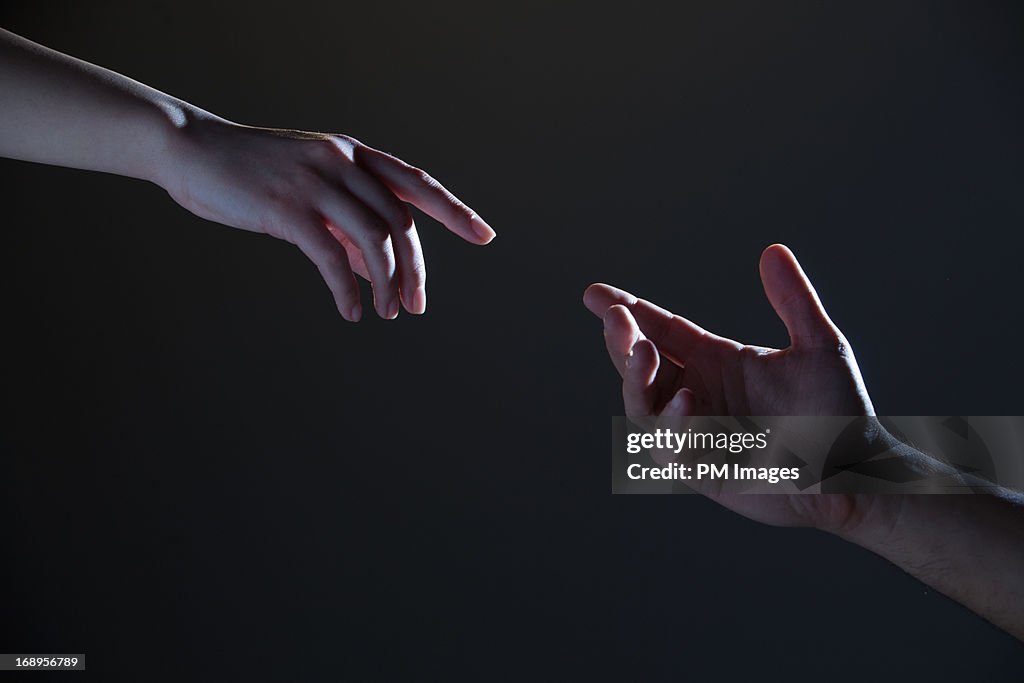 Touch Using Hand Hands Trying To Touch High-Res Stock Photo - Getty Images