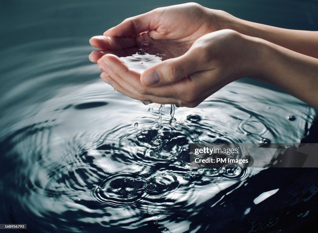 Holding water in cupped hands