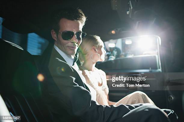 paparazzi taking pictures of celebrities in limo - audi interior stock pictures, royalty-free photos & images