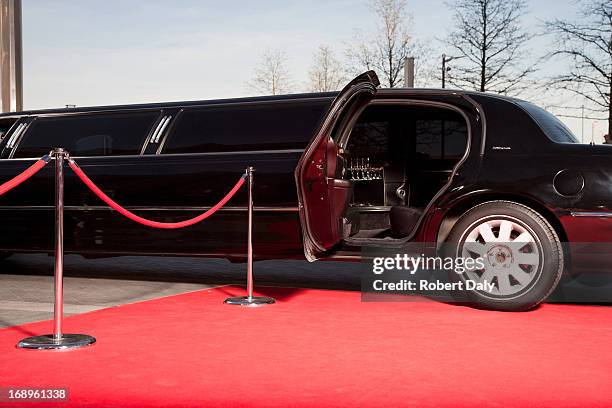 limo with open door on red carpet - limo stockfoto's en -beelden