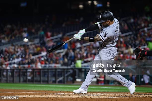 Yoan Moncada of the Chicago White Sox doubles against the Washington Nationals during the fourth inning at Nationals Park on September 18, 2023 in...