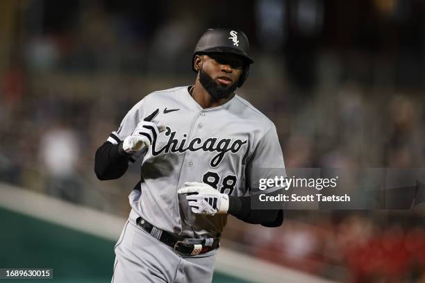Luis Robert Jr. #88 of the Chicago White Sox points while rounding the bases after hitting a three run home run against the Washington Nationals...