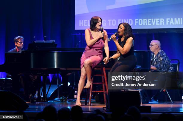 Gracie McGraw and Sharon Catherine Brown perform onstage during the 9th Annual "Voices: Stars For Foster Kids" Benefit Concert hosted by You Gotta...