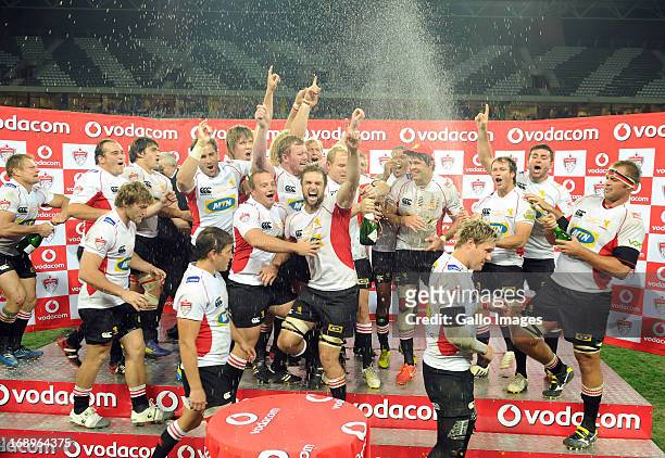 The Lions celebrate with the cup during the Vodacom Cup Final match between Steval Pumas and MTN Golden Lions at Mbombela Stadium on May 17, 2013 in...