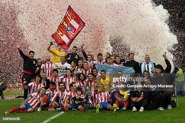 Atletico de Madrid team holds the trophy in celebration after the Copa del Rey Final match between Real Madrid CF and Club Atletico de Madrid at...