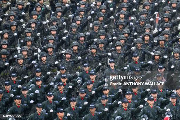 Soldiers take part in a military parade to celebrate South Korea's 75th Armed Forces Day in Seoul on September 26, 2023. South Korea staged its first...