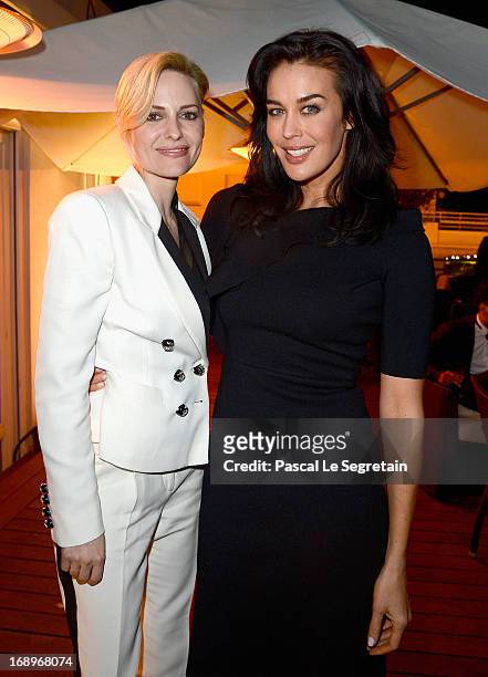 Aimee Mullins and Megan Gale attend the L'Or Sunset Showcase with Micky Green for L'Oreal during The 66th Annual Cannes Film Festival at Hotel...