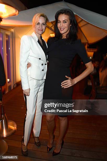 Aimee Mullins and Megan Gale attend the L'Or Sunset Showcase with Micky Green for L'Oreal during The 66th Annual Cannes Film Festival at Hotel...