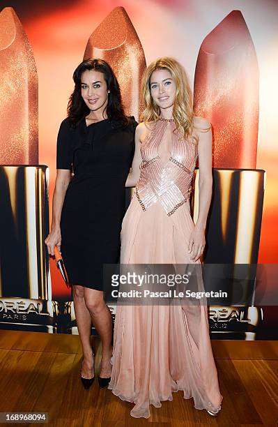 Model Doutzen Kroes and Megan Gale attend the L'Or Sunset Showcase with Micky Green for L'Oreal during The 66th Annual Cannes Film Festival on May...