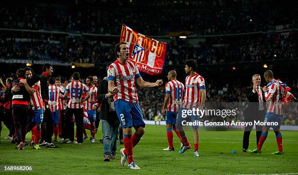 Diego Godin celebrates winning the match after the Copa del Rey Final match between Real Madrid CF and Club Atletico de Madrid at Estadio Santiago...