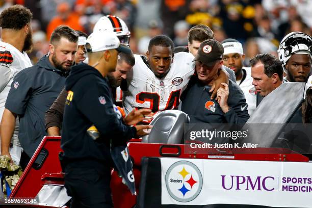 Nick Chubb of the Cleveland Browns is carted off the field after sustaining a knee injury during the second quarter against the Pittsburgh Steelers...