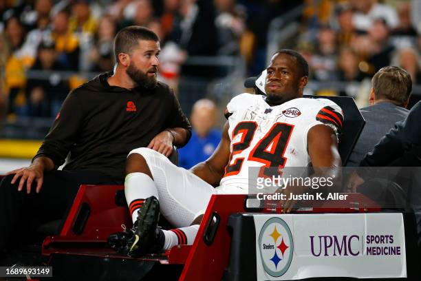 Nick Chubb of the Cleveland Browns is carted off the field after sustaining a knee injury during the second quarter against the Pittsburgh Steelers...
