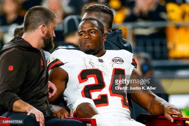Nick Chubb of the Cleveland Browns is carted off the field after sustaining a knee injury during the second quarter against the Pittsburgh Steelers...