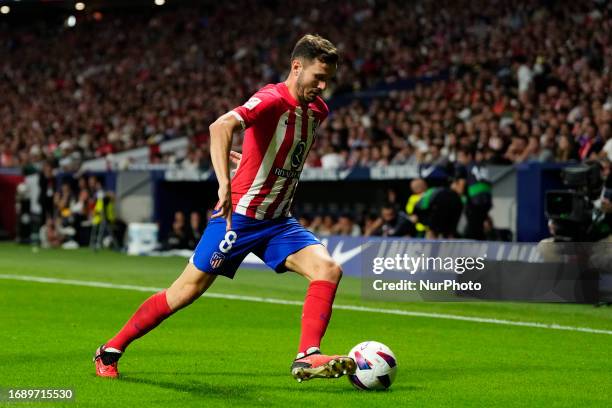 Saul Ñiguez central midfield of Atletico de Madrid and Spain controls the ball during the LaLiga EA Sports match between Atletico Madrid and Real...