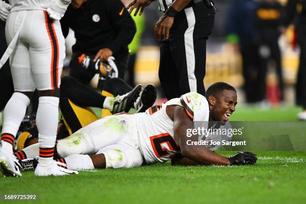 Nick Chubb of the Cleveland Browns reacts after sustaining a knee injury against the Pittsburgh Steelers during the second quarter at Acrisure...