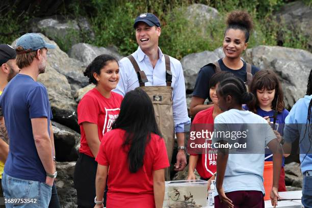 William, Prince of Wales speaks with kids as he visits Billion Oyster Project in New York City on September 18, 2023 in New York City.