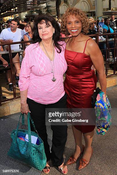 Actresses Lana Wood and Gloria Hendry arrive at the opening ceremony of Las Vegas Car Stars at the Fremont Street Experience on May 17, 2013 in Las...