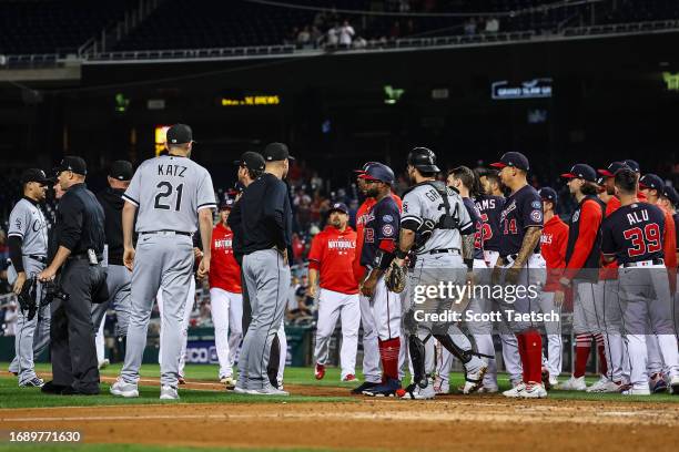 Benches clear after an exchange of words between Dominic Smith of the Washington Nationals and Mike Clevinger of the Chicago White Sox during the...