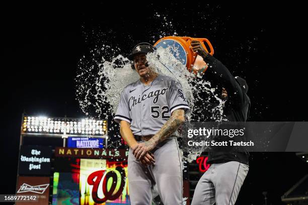 Mike Clevinger of the Chicago White Sox is doused with water after the game against the Washington Nationals at Nationals Park on September 18, 2023...