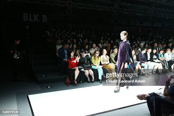 Model showcases designs by Ko Youngji of South Korea during the Audi Star Creation Capsule Showcase on May 17, 2013 in Singapore.