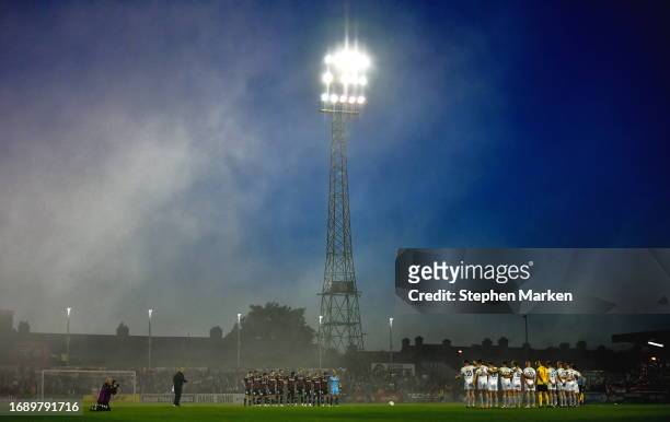 Dublin , Ireland - 25 September 2023; Players from both teams stand for a moments silence before the SSE Airtricity Men's Premier Division match...