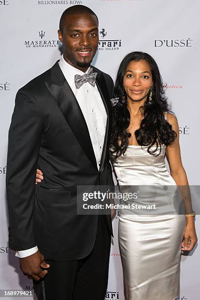 Plaxico Burress and Tiffany Burress attend the Plaxico Burress Collection launch event at XVI on May 17, 2013 in New York City.