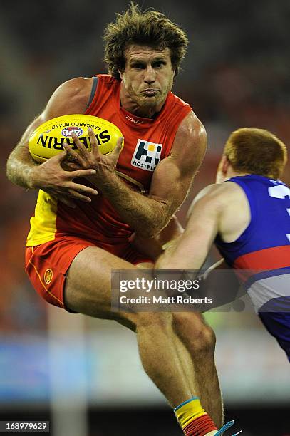 Campbell Brown of the Suns marks during the round eight AFL match between the Gold Coast Suns and the Western Bulldogs at Metricon Stadium on May 18,...
