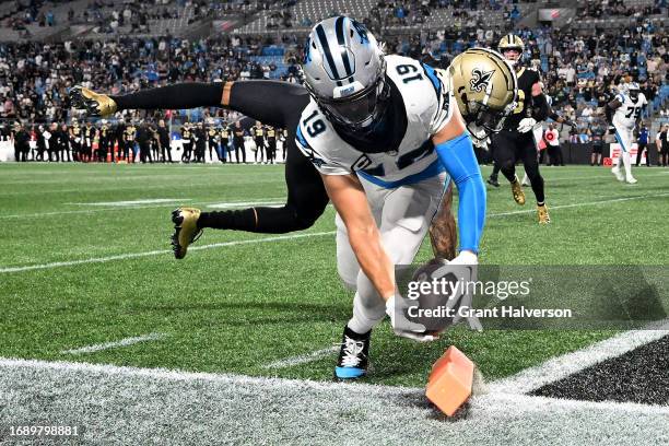 Adam Thielen of the Carolina Panthers scores a touchdown against Alontae Taylor of the New Orleans Saints during the fourth quarter in the game at...