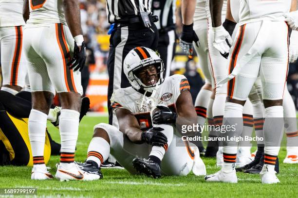 Nick Chubb of the Cleveland Browns reacts after hurting his knee during the second quarter of the game against the Pittsburgh Steelers at Acrisure...